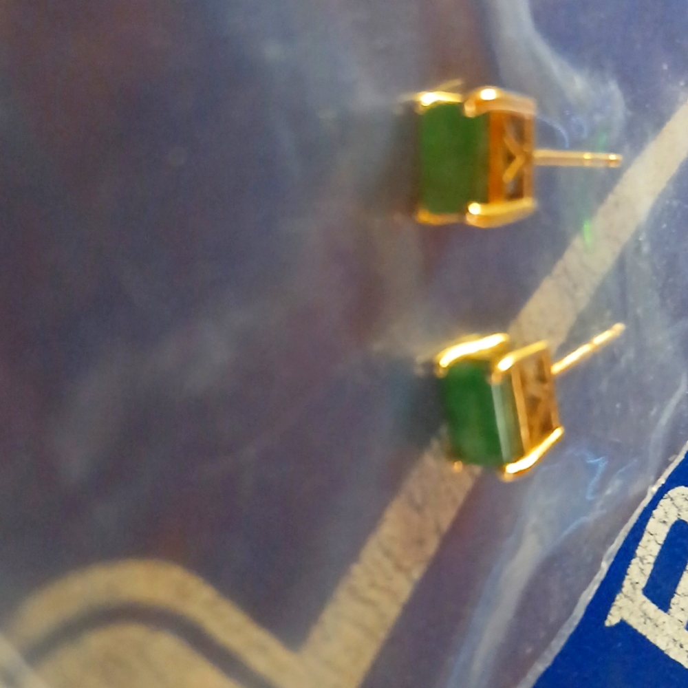 Emeralds set in 24k gold earrings